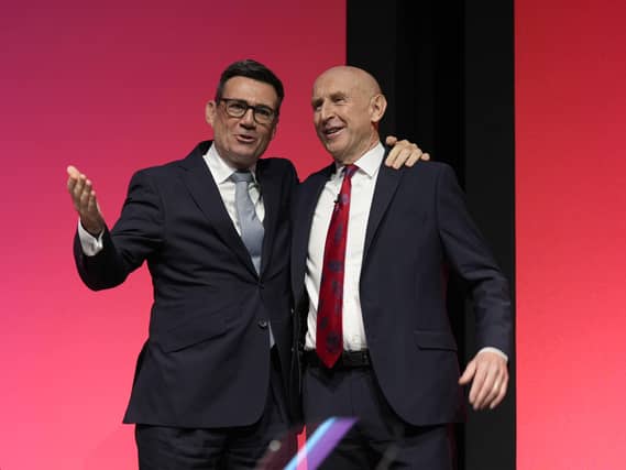 Prime Minister Andy Burnham (left) with Chancellor of the Exchequer John Healey on the main stage during the Labour Party Conference in Liverpool in September 2026