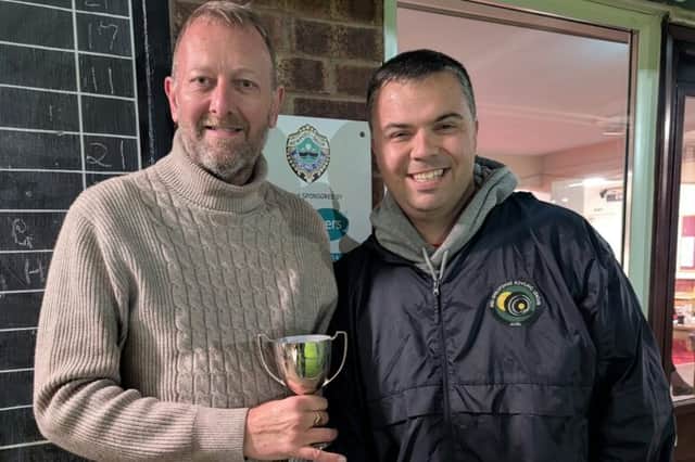 More Mid Shropshire magic for Stuart Rutter, seen receiving the Thursday Merit trophy from Rob Burroughs