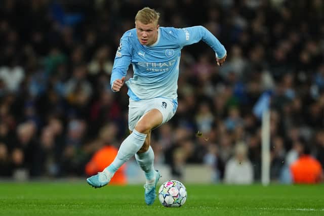 Erling Haaland scored twice for City to become the club’s record Champions League goalscorer (Martin Rickett/PA)