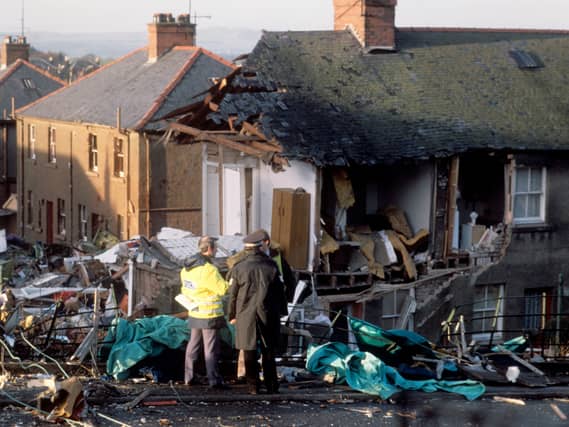 Police officers at the scene in Lockerbie