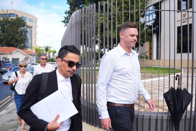 Joshua Foster (right) arriving at court with his lawyer Alexandros Alexandrou (James Manning/PA)