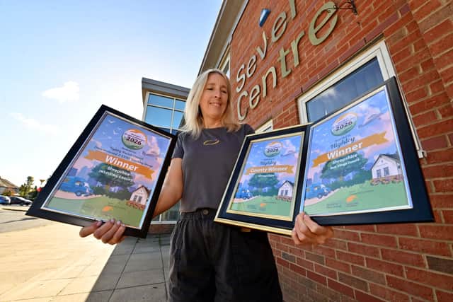 Emma Aspin shows off some of the awards.