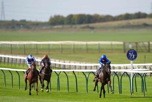 A general view of Talk Of New York ridden by William Buick (right) on their way to winning the Betway Joel Stakes (Joe Giddens/PA)