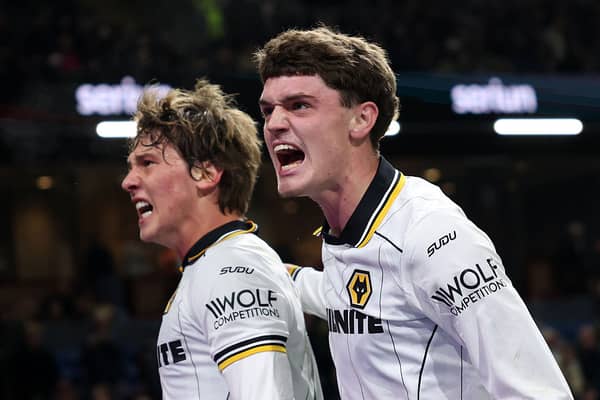 Fer Lopez (left) celebrates with Sean Neave after scoring for Wolves against Burnley 