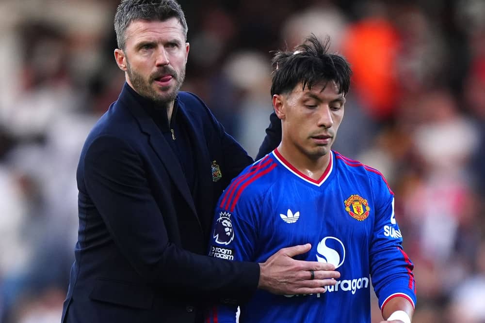 Manchester United manager Michael Carrick with Lisandro Martinez
