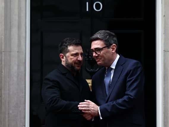 Volodymyr Zelensky shakes hands with Andy Burnham outside 10 Downing Street