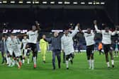 Wolves players celebrate their comeback win over Burnley