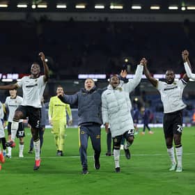 Wolves players celebrate their comeback win over Burnley
