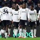 Wolves players celebrate after Tawanda Chirewa puts them 2-1 ahead at Burnley