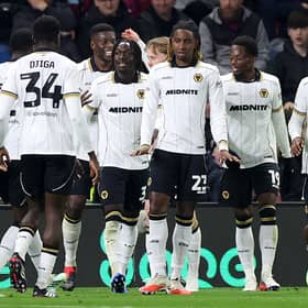 Wolves players celebrate after Tawanda Chirewa puts them 2-1 ahead at Burnley