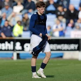 Jay Turner-Cooke of Shrewsbury Town reacts after being sent off