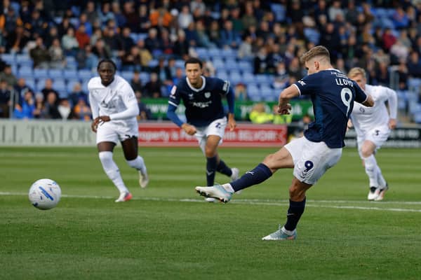 George Lloyd of Shrewsbury Town scores a goal to make it 1-0 from the penalty spot
