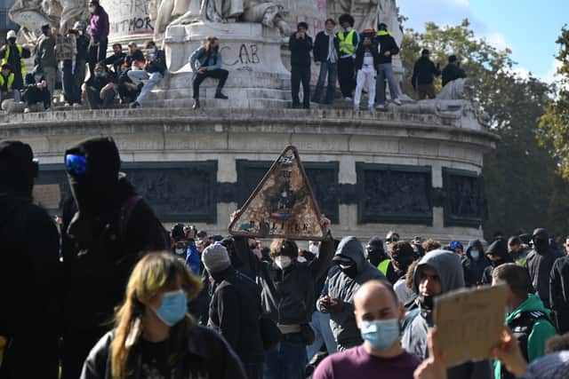Protesters demonstrate against rising living costs, joining students’ grievances, in Paris (AP)