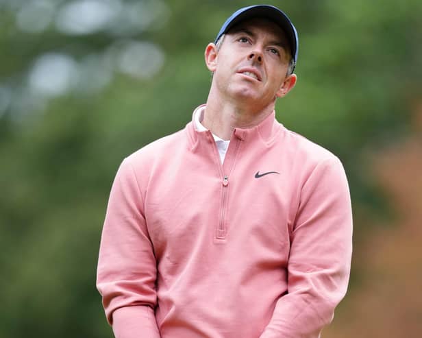 Rory McIlroy looks frustrated after a missed putt