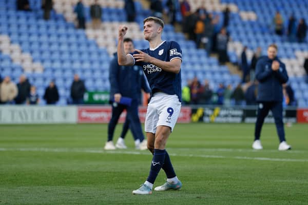 George Lloyd of Shrewsbury Town reacts at full time