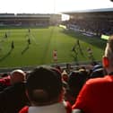 General view of match action from the stands at Fleetwood