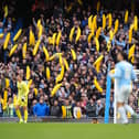 Manchester City fans with inflatable bananas in the stands against Ipswich