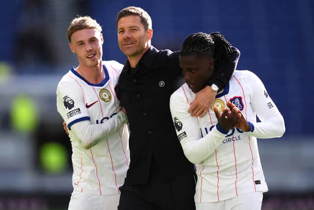 Chelsea boss Xabi Alonso, centre, celebrates the win at Everton with Cole Palmer and Geovany Quenda (PA)