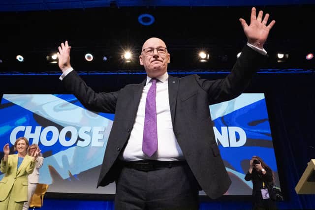 First Minister John Swinney received a standing ovation after delivering his conference speech (Jane Barlow/PA)