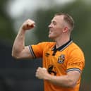 Cambridge’s Shayne Lavery celebrates scoring