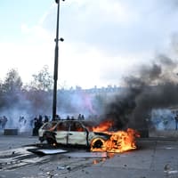 Clashes and fires break out as protesters rally across France