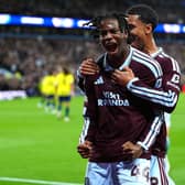 Aston Villa’s Johan Manzambi (left) celebrates scoring