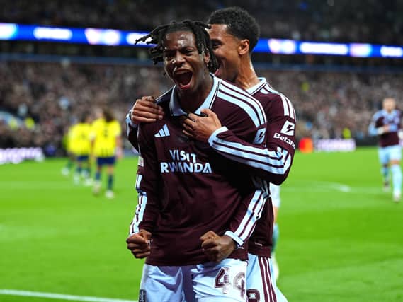 Aston Villa’s Johan Manzambi (left) celebrates scoring