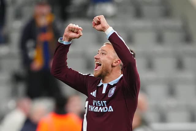 Matty Cash celebrates Villa’s win after the final whistle (Owen Humphreys/PA)