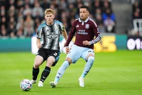 Aston Villa’s Alysson (right) tussles with Lewis Hall of Newcastle (Owen Humphreys/PA)