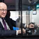 John Swinney on a bus