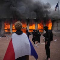 Clashes, fires and looting break out as protesters rally across France