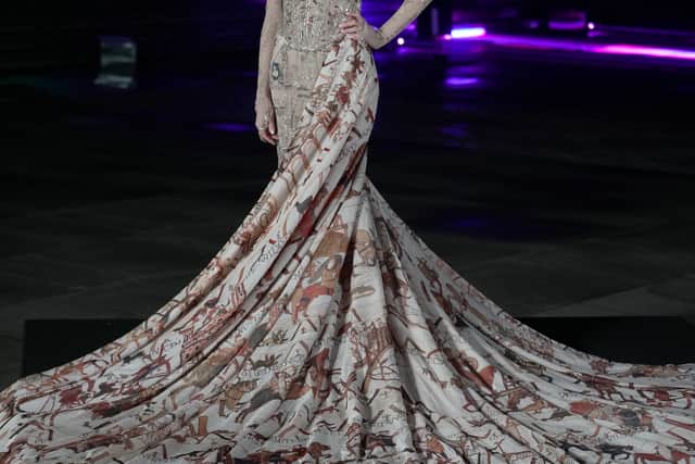 Host Rosanna Konarzewski wearing a Bayeux Tapestry dress (Jeff Moore/PA)