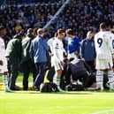 Chelsea goalkeeper Emiliano Martinez received treatment after a head clash at Everton (Mike Egerton/PA)