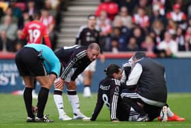 Dominik Szoboszlai is treated on the pitch