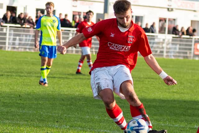 Adam Hailes curled home a settling second for Whitchurch Alport against Uttoxeter.