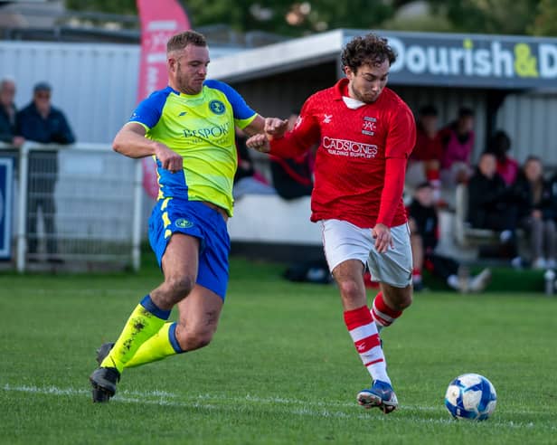 Whitchurch Alport goalscorer Ollie Holden in action against Uttoxeter