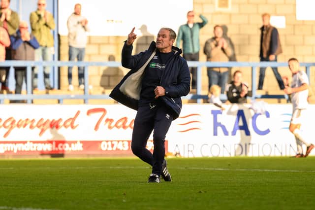 Kevin Wilkin celebrated the Darlington win in style at the SEAH Stadium