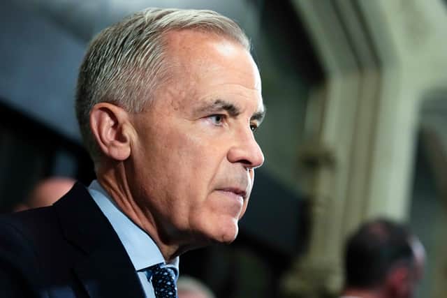 Canadian Prime Minister Mark Carney said flags would fly at half-mast on federal buildings across the country (Justin Tang/The Canadian Press via AP)