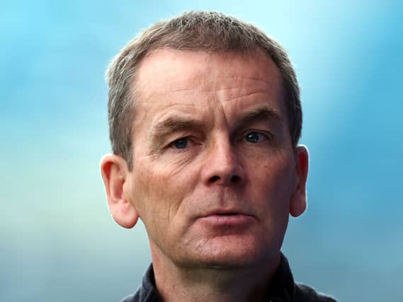 John Doolan looks on