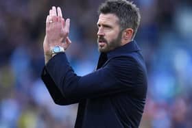 Michael Carrick applauds