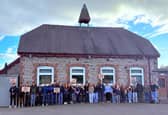 Gladestry young people show their support for their local at risk school.