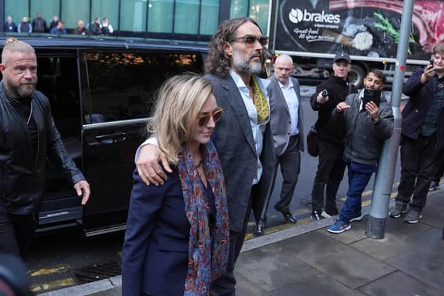 Russell Brand with his wife Laura Gallacher (Maja Smiejkowska/PA)