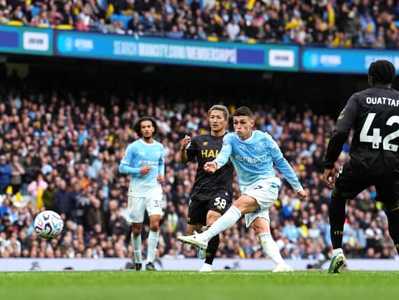Manchester City’s Phil Foden attempts a shot on goal