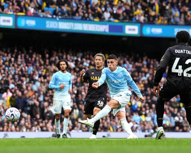 Manchester City’s Phil Foden attempts a shot on goal