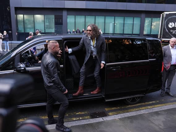 Russell Brand denies seven charges at Southwark Crown Court