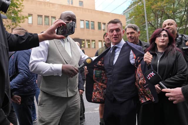 Tommy Robinson, whose real name is Stephen Yaxley-Lennon, poses for a live stream recording as he returns after the lunch break to Southwark Crown Court (Maja Smiejkowska/PA)