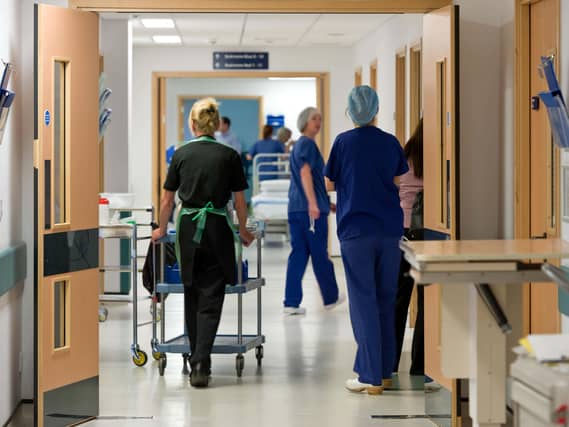 A busy corridor in an NHS hospital in England