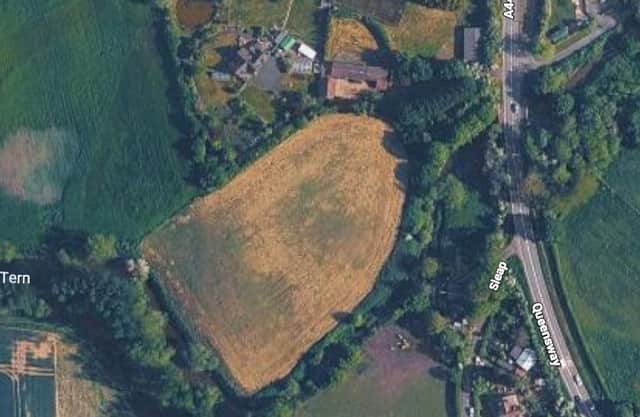 The site of a proposed four bed house on grassland in Crudgington