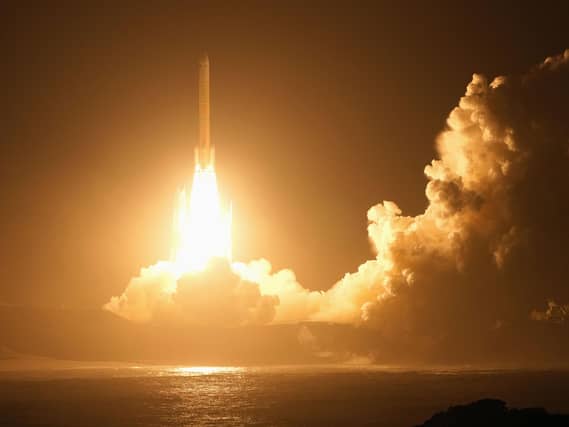 An H3 rocket lifts off from the Tanegashima Space Center in Kagoshima prefecture