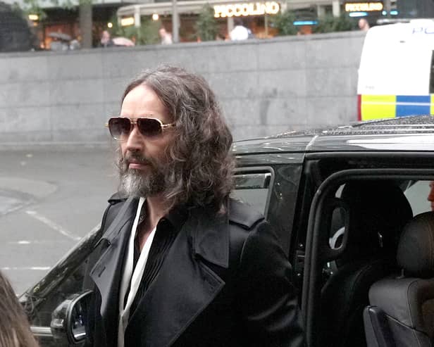 Russell Brand arrives at court